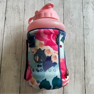 PREOWNED HYDRO JUG PINK WITH FLORAL SLEEVE FLOWERS WITH STRAW